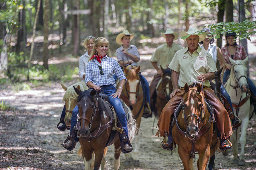 people on horses