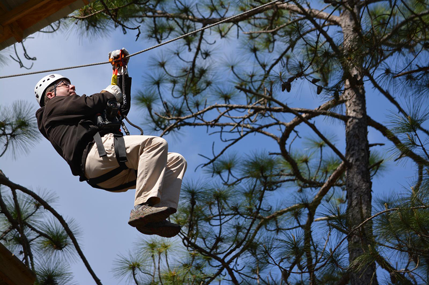 man ziplining