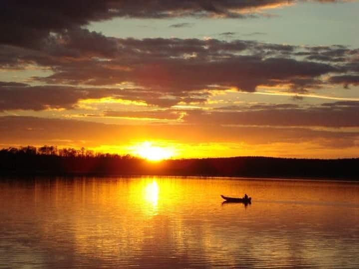 fishing boat at sunrise 