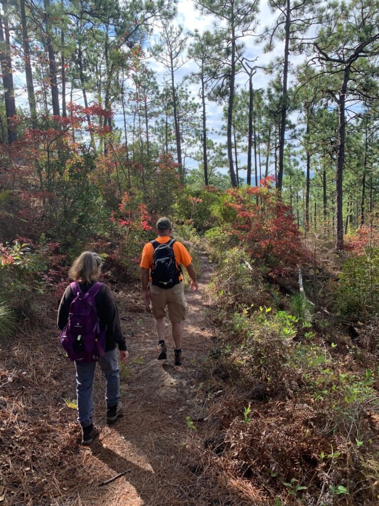 man and woman hiking 