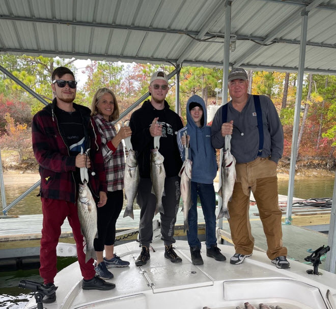 people holding fish