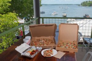 pizza and wings on a table at chuckwalla's pizza