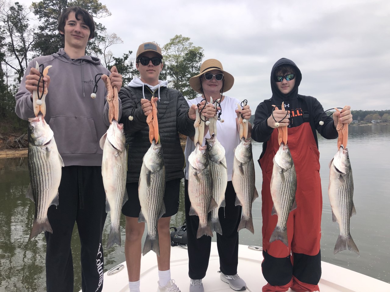 people holding fish