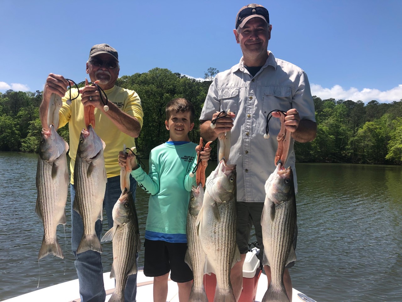 father and sons fishing