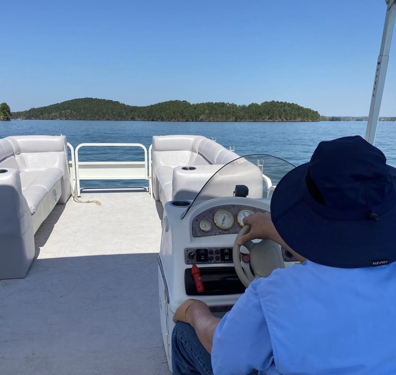 man driving boat