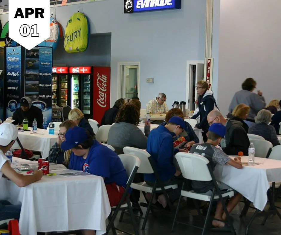 Group of people sitting inside a restaurant