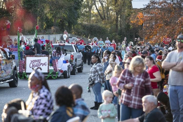 Group of people gathered for a Christmas parade