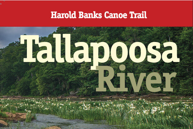 Cover to Howard Banks Canoe Trail Guide, with a scenic stretch of river and paddler