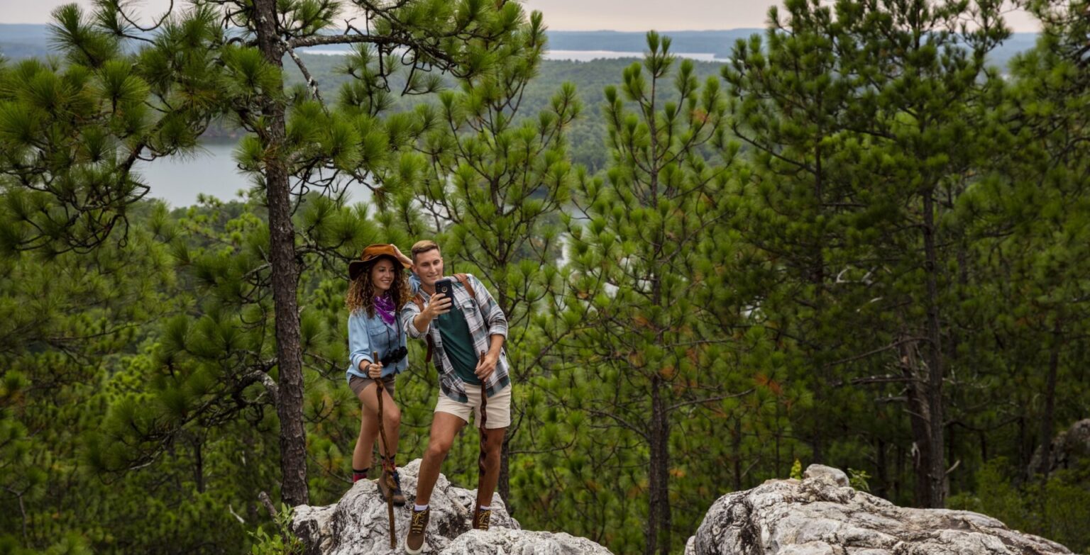 Hikers stop at peak for a selfie